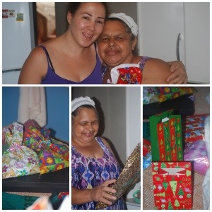 Aparecida receives her gifts from Vivi and family