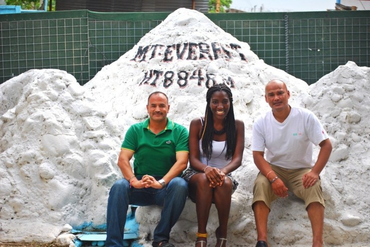  lt.col.Sanukaji Thapa, myself in the middle and  Maj.Birendra sit by a mounument of the highest peak of the world: Mount Everest