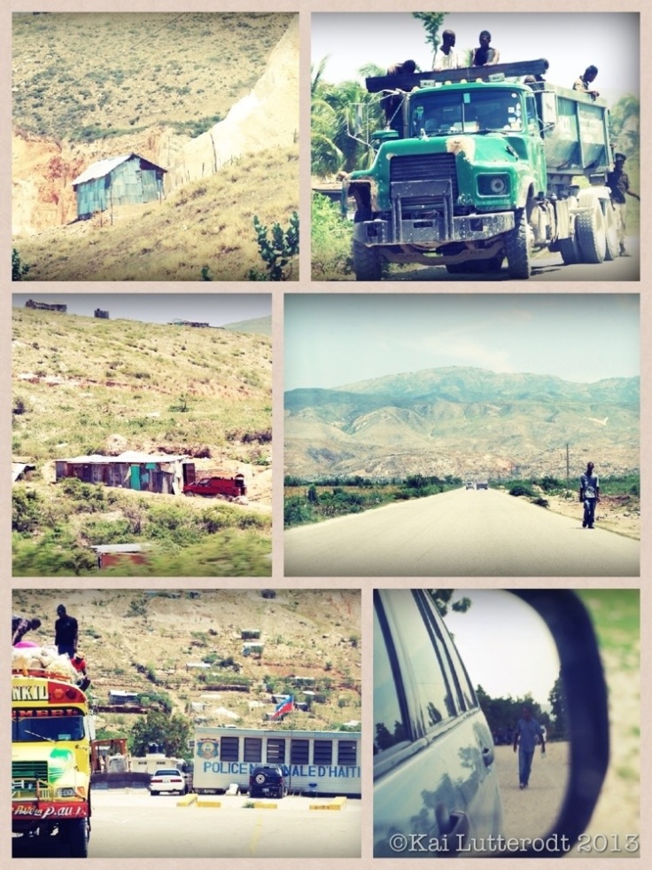 On the highway passing by the 'naked mountain'. Many inhabitants of Port-au-Prince fled to the outskirts of the city after the 2010 earthquake, putting up shacks in any available space on the bare mountain.